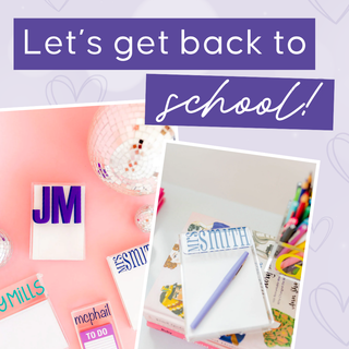 Promotional graphic for school supplies and personalized bags, featuring a central photo of an organized desk setup with notebooks, pens, and stickers, alongside text reading 'Let's get back to school!' on a pastel pink and lavender background | Whatsoever Things | Dallas, TX