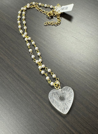 Radiant puff heart necklace on pearls