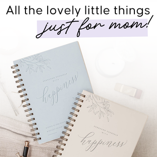 Two spiral-bound notebooks with text on a soft fabric background, accompanied by promotional text about gifts for mom from Whatsoever Things | Dallas, TX